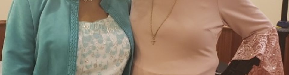 Two women in church attire